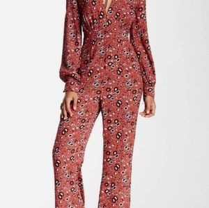 Free People "Some like it hot"  jumpsuit, sz 6